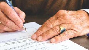 person signing a lease agreement