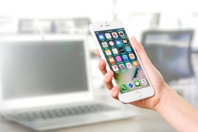 person-holding-an-iphone